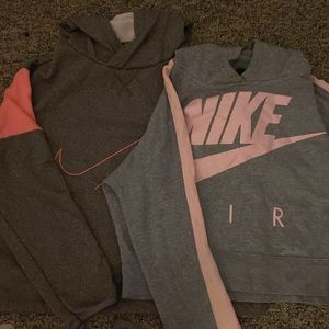 Two pink Nike cropped hoodies (XL/L)